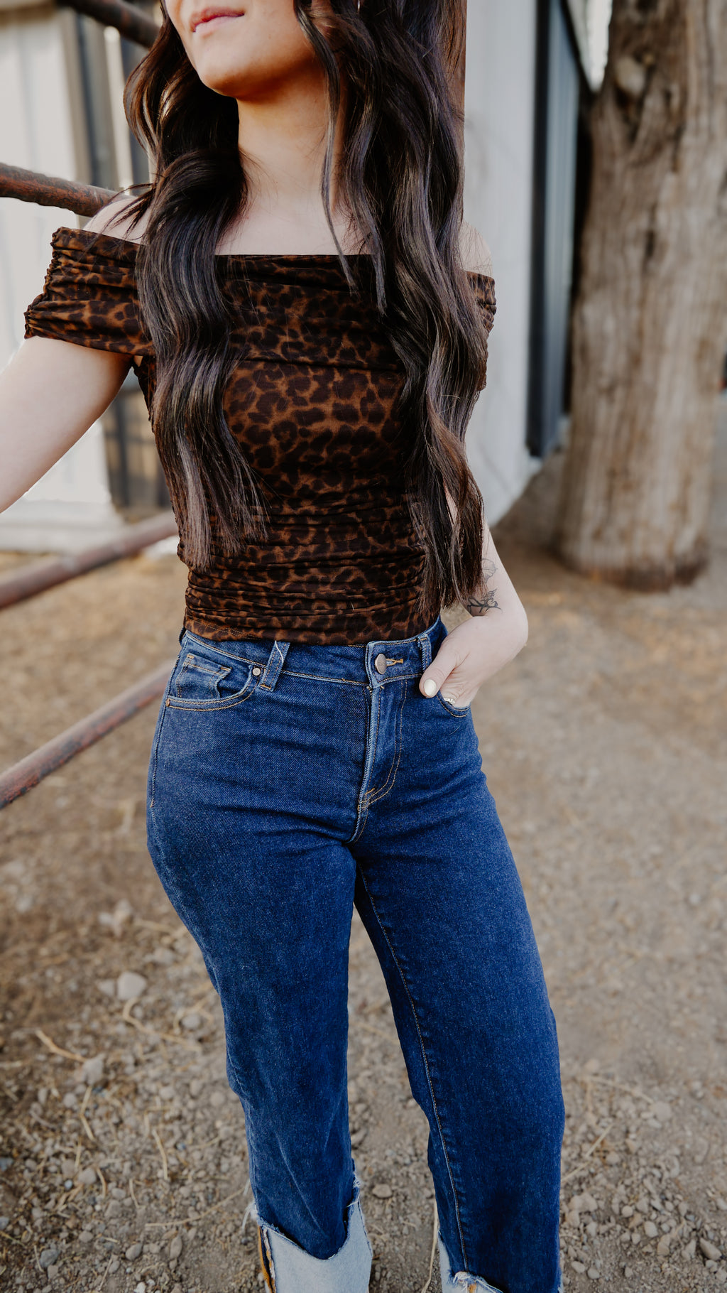 THE BRI OFF-SHOULDER RUCHED ANIMAL PRINT KNIT TOP
