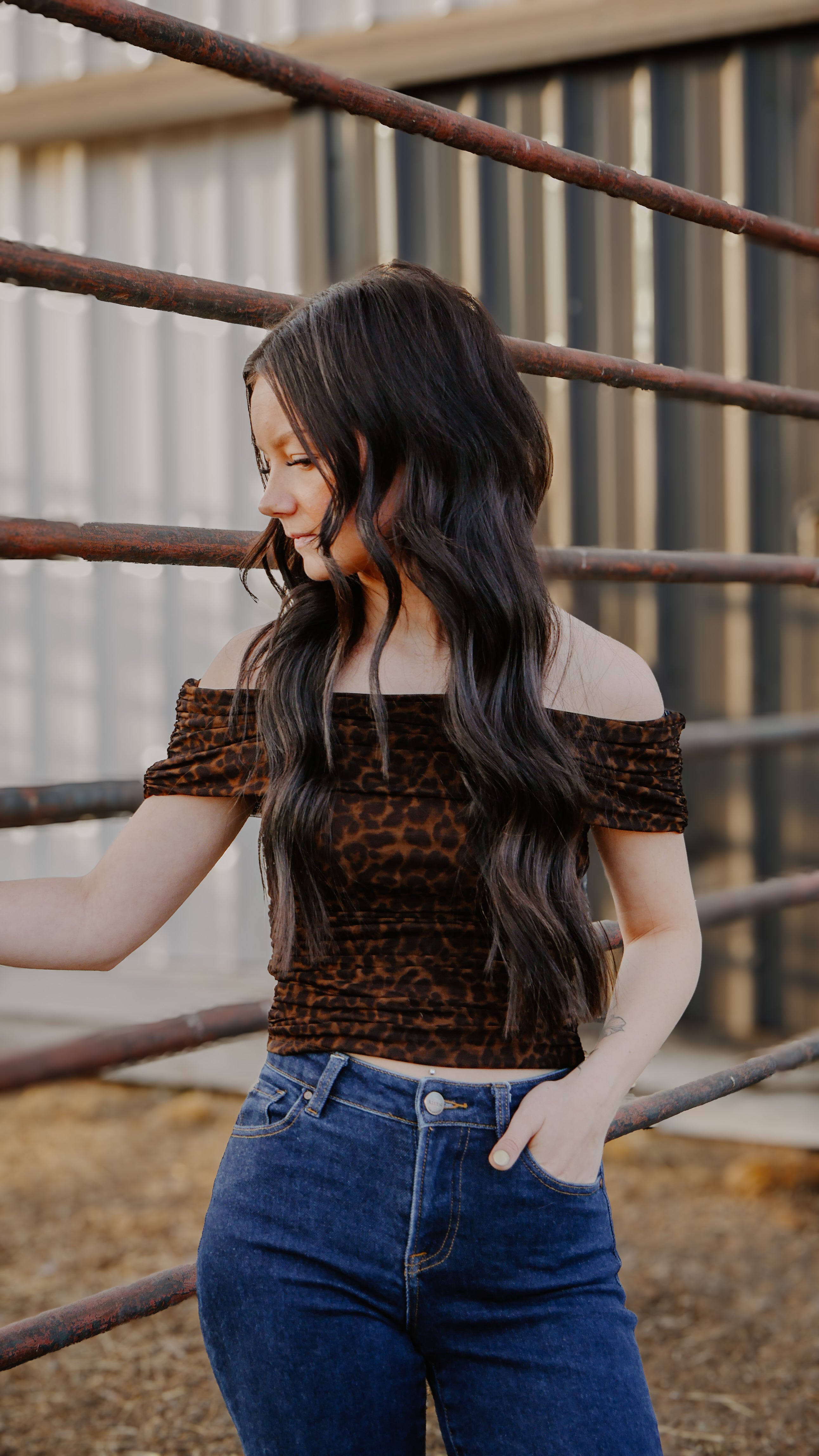 THE BRI OFF-SHOULDER RUCHED ANIMAL PRINT KNIT TOP